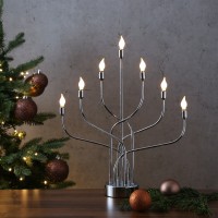 Vorschau: LED Fensterleuchter AURA - 7flammig - warmweiße LED - H: 46cm - Batteriebetrieb - Timer - silber Vorschau: LED Fensterleuchter AURA - 7flammig - warmweiße LED - H: 46cm - Batteriebetrieb - Timer - silber