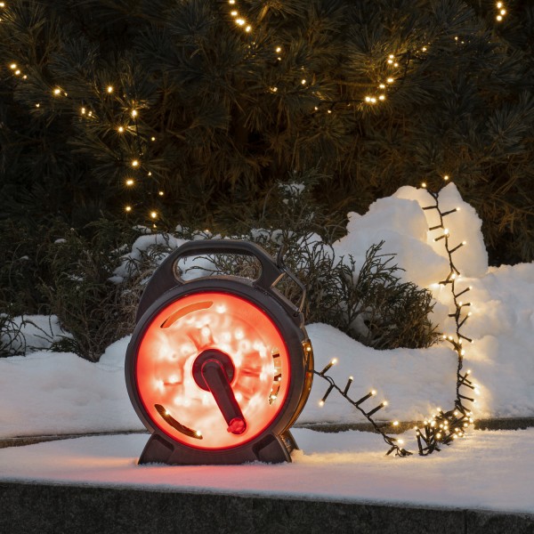 LED Lichterkette mit Kabelaufroller - 400 warmweiße LED - L: 8,78m - Außen - Trafo - schwarz/rot