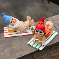 Vorschau: Gartenzwerg BERT - Dekofigur liegend auf Strandtuch - Polyresin - H: 17,5cm - bunt Vorschau: Gartenzwerg BERT - Dekofigur liegend auf Strandtuch - Polyresin - H: 17,5cm - bunt