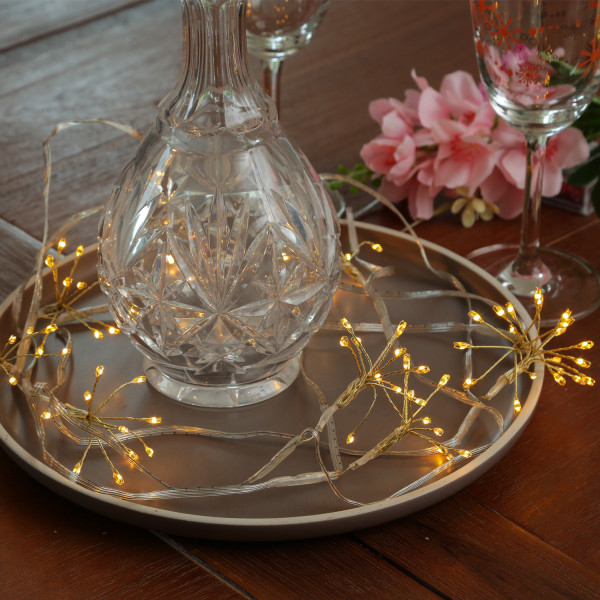 LED Lichterkette Pusteblume - Feuerwerk Blume - 50 Tautropfen LED - 5 Blüten - L: 1m - Timer - gold