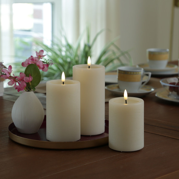 LED Kerzenset UNIQUE - Rustik-Optik - 3 Größen - mit Batterien/Fernbedienung - creme - 3er Set